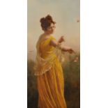 19th Century European School. An Elegant Lady, standing in a Landscape, surrounded by Butterflies,