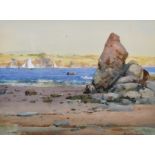 Frank Richards (1863-1935) British. A Rocky Beach Scene, with Sailing Boats in the distance,