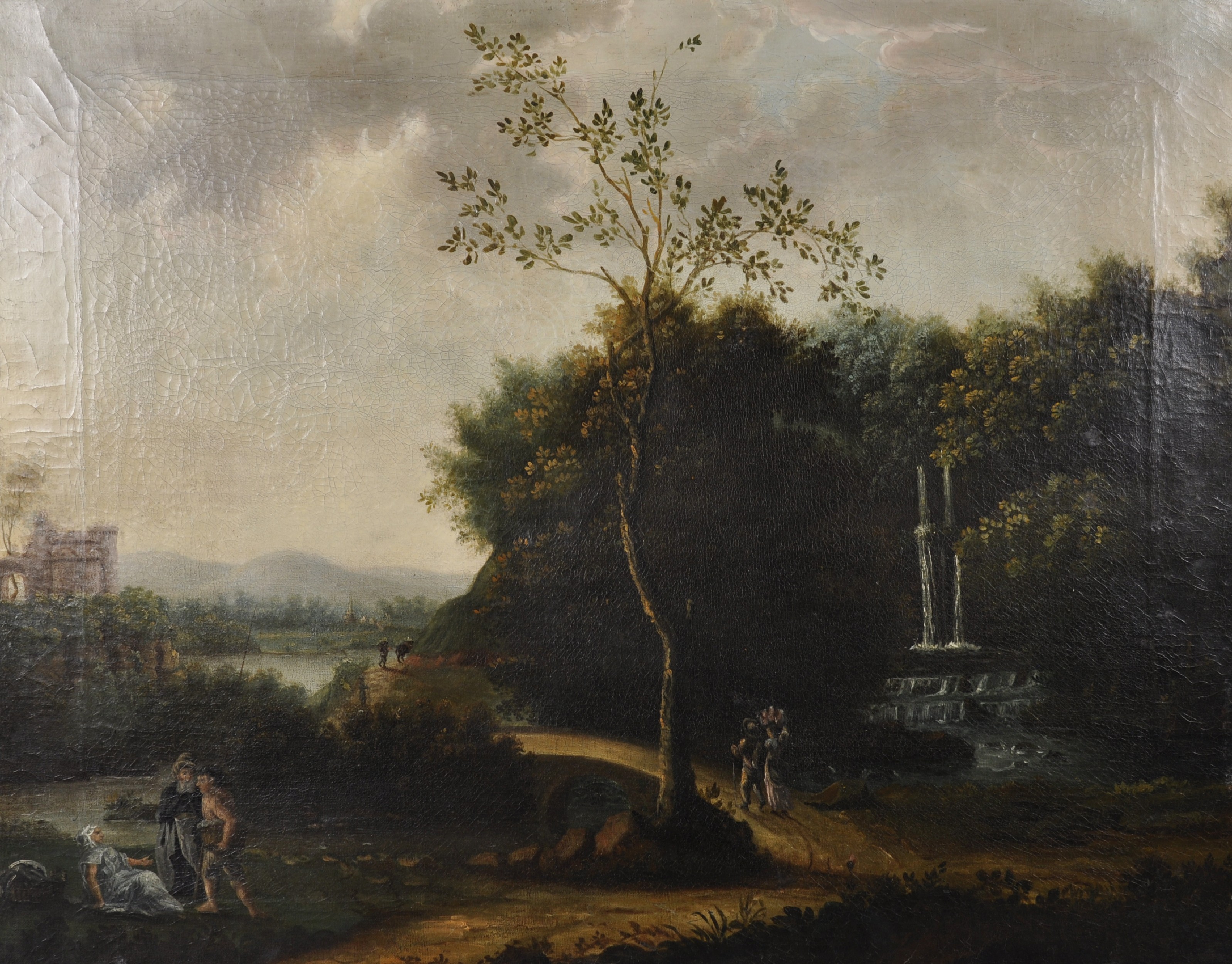 18th Century Dutch School. Figures resting on a Path, with a Waterfall in Woods behind, and a Castle