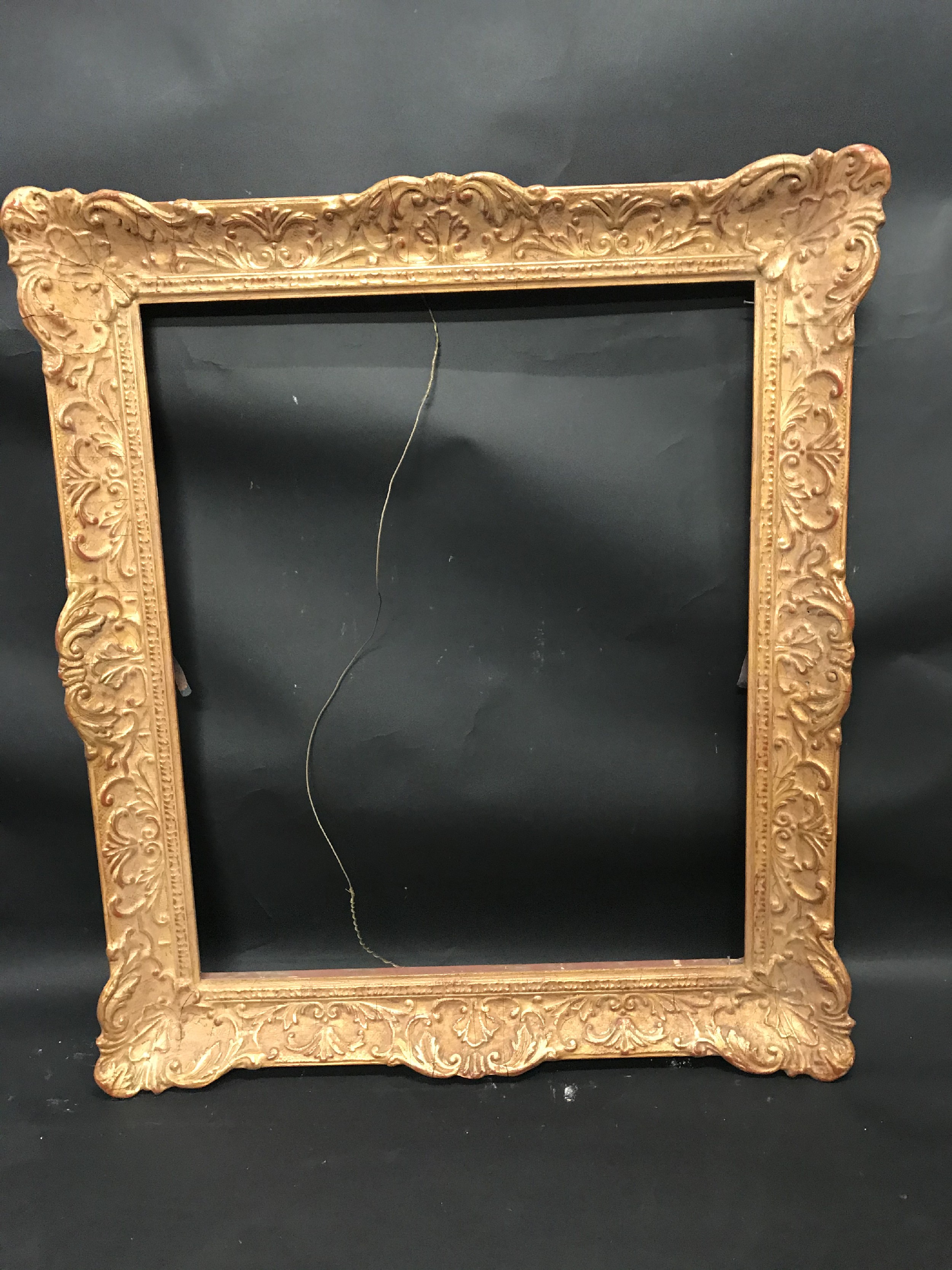 20th Century English School. A Gilt Composition Frame, we swept centres and corners, 23.5" x 19. - Image 2 of 3