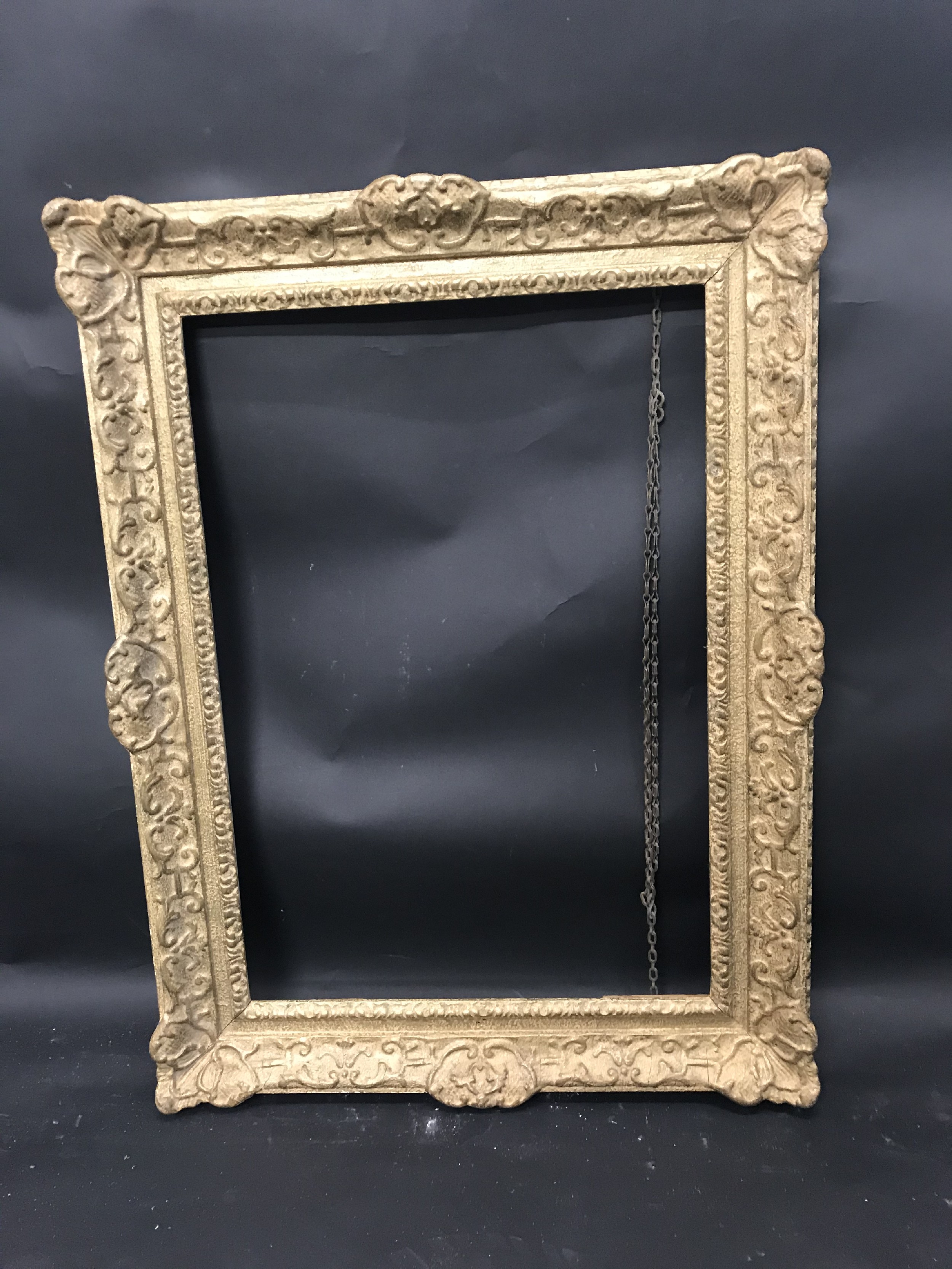 20th Century English School. A Gilt Composition Frame, with swept centres and corners, 23" x 16" ( - Image 2 of 3