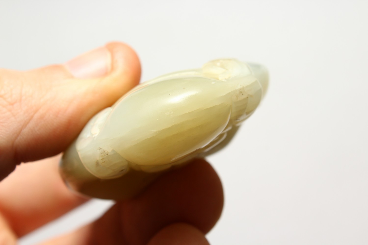 A GOOD CHINESE CARVED JADE PEBBLE OF SHOU LAO, the carving depicting shou lao god of longevity, 7. - Image 7 of 7