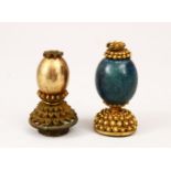 TWO GOOD CHINESE 19TH CENTURY MANDARIN HARD STONE AND GILT METAL FINIAL'S, of acorn form with