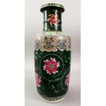 A 19TH CENTURY CHINESE FAMILLE NOIR PORCELAIN VASE, decorated upon a blacK glaze with formal