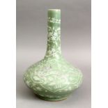 A GOOD 19TH CENTURY CHINESE CELADON INCISED DRAGON PORCELAIN VASE, the body of the vase decorated