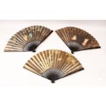 THREE JAPANESE MEIJI PERIOD LACQUER & PAINTED PAPER FANS, each painted to depict figures amongst
