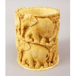A JAPANESE MEIJI PERIOD CARVED IVORY ELEPHANT TUSK VASE / POT, the pot carved in deep relief to