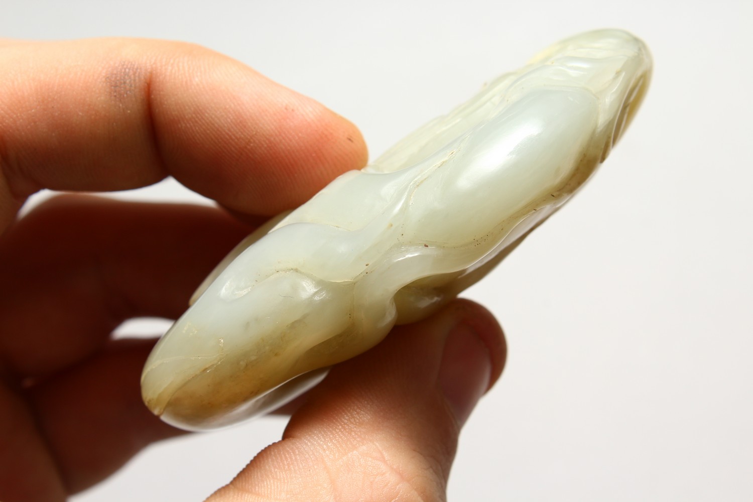 A GOOD CHINESE CARVED JADE PEBBLE OF SHOU LAO, the carving depicting shou lao god of longevity, 7. - Image 5 of 7