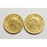TWO CHINESE GOLD COLOURED METAL CURRENCY COINS, 3.5CM EACH. (2)