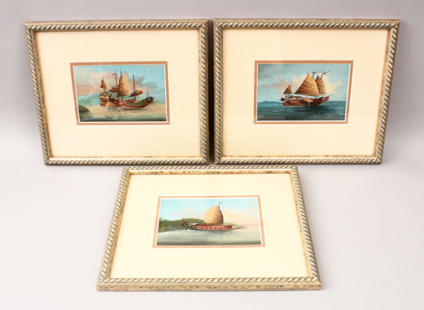 THREE 19TH CENTURY CHINESE WATERCOLOUR ON GOUACHE OF JUNKS, framed measuring 30.5cm x 26cm.(3)
