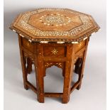 A 19TH CENTURY INDIAN HARDWOOD OCTAGONAL TRAVELLING OCCASIONAL TABLE, the table inlaid with bone