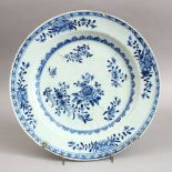 AN 18TH CENTURY CHINESE QIANLONG BLUE & WHITE PORCELAIN DISH, decorated with native floral scenes,