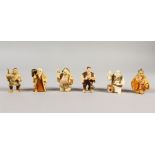 A GROUP OF SIX JAPANESE POLYCHROMED IVORY NETSUKES, including one of the seven lucky gods - Ebisu, a