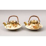 A GOOD PAIR OF JAPANESE MEIJI PERIOD SATSUMA TEA POTS, both decorated in simple tate to depict