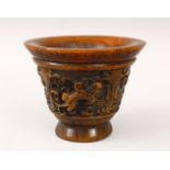 A CHINESE CARVED HORN LIBATION CUP, with archaic style carving and chilong, the base with an