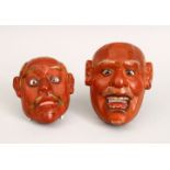 TWO JAPANESE LACQUER NOH MASKS, each detailed with glass eyes, one with hair details, 9cm & 11cm.