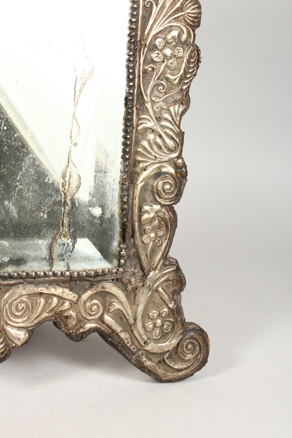 A GOOD 18TH CENTURY OTTOMAN SILVER BEVELLED GLASS MIRROR, the frame with embossed scrolling foliage, - Image 6 of 10