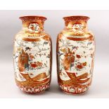 A GOOD PAIR OF JAPANESE MEIJI PERIOD KUTANI PORCELAIN VASES, with panel decoration depicting figures