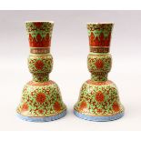A PAIR OF FINE QUALITY CHINESE JIAQING MARK & PERIOD LIME GREEN & IRON RED PORCELAIN GU VASES, the
