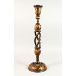 A LARGE 19TH CENTURY INDIAN KASHMIR CANDLESTICK, with finely painted floral decoration, 51cm high.