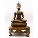A LARGE 19TH / 20TH CENTURY TIBETAN / THAI BRONXE FIGURE OF BUDDHA, in a seated position upon a