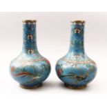 A GOOD PAIR OF 18TH / 19TH CENTURY CHINESE CLOISONNE BOTTLE VASES, decorated with scenes of birds