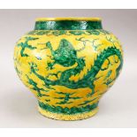 A GOOD CHINESE FAMILLE VERTE PORCELAIN DRAGOON VASE, the body of the vase with a yellow ground