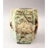 A GOOD CHINESE MING POTTERY MINIATURE BARREL STOOL, with open work decoration in hexagonal form, the
