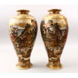 A GOOD PAIR OF JAPANESE MEIJI PERIOD SATSUMA VASES, the ovoid body decorated with scenes of warriors