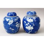 TWO GOOD 19TH CENTURY CHINESE BLUE & WHITE PRUNUS PORCELAIN GINGER JARS AND COVERS, the bases with