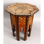 A 19TH CENTURY MOORISH CARVED HARDWOOD OCTAGONAL INLAID OCCASIONAL TABLE, inlaid with mother of