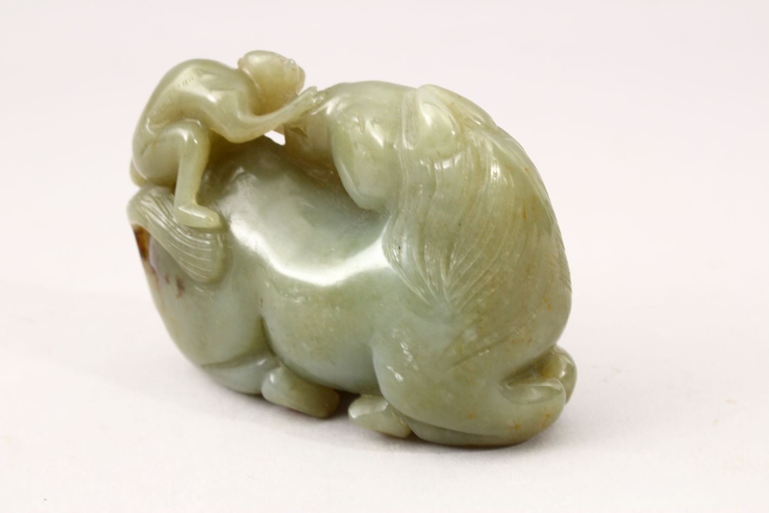 A GOOD 19TH CENTURY CHINESE CARVED JADE FIGURE OF A SEATED HORSE, the horse with a monkey climing - Image 2 of 6