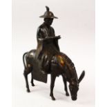 A GOOD 19TH / 20TH CENTURY CHINESE BRONZE FIGURE OF A MAN UPON HORSEBACK, wearing a hat, holding a