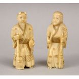 TWO JAPANESE MEIJI PERIOD CARVED IVORY OKIMONO OF MAN AND LADY, the man stood with a brush and a