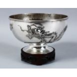 A GOOD 19TH CENTURY CHINESE SOLID SILVER DRAGON BOWL & STAND, the body of the bowl decorated with
