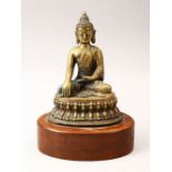 A 19TH / 20TH CENTURY BRONZE FIGURE OF A SEATED BUDDHA, mounted to a wooden base, 20cm high.