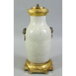 A 20TH CENTURY CHINESE CRACKLE GLAZED PORCELAIN VASE, with moulded lion mask & ring handles, and