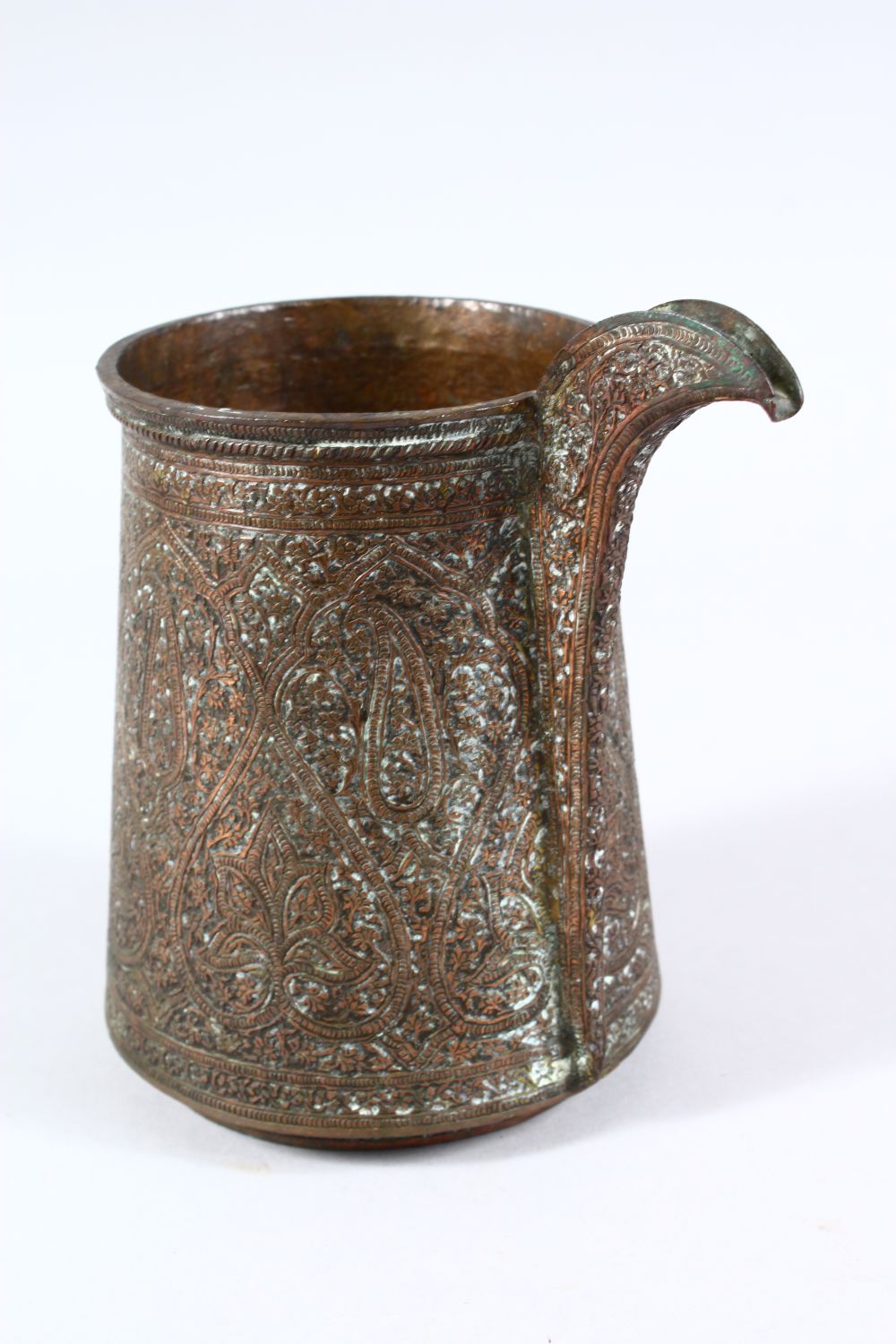 A 19TH CENTURY OR EARLIER INDO PERSIAN COPPERED BRASS SPOUTED JUG, with chased floral motiv - Image 2 of 5