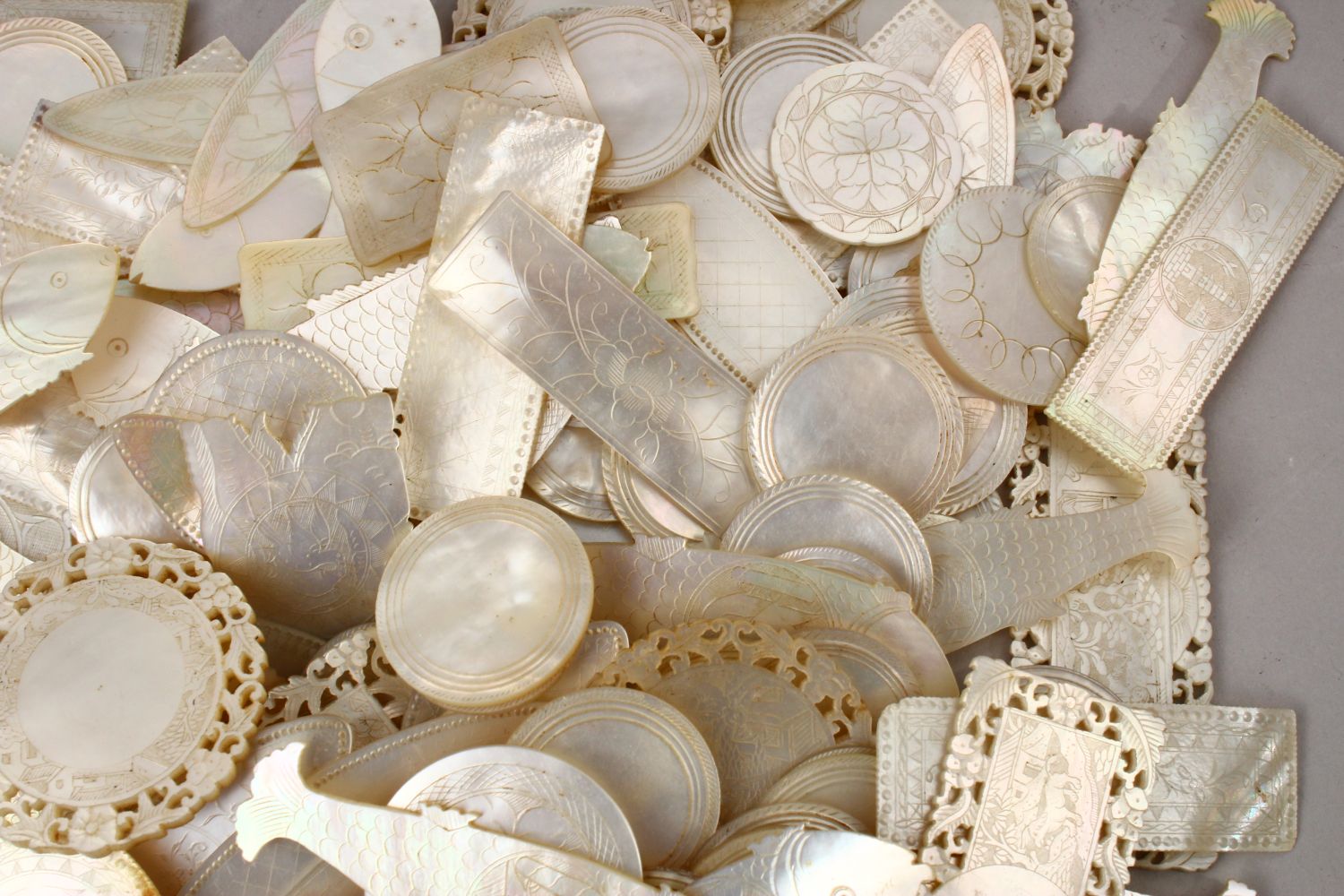 A QUANTITY OF 19TH CENTURY CHINESE CARVED MOTHER OF PEARL GAME COUNTERS, various styles an sizes. - Image 7 of 9