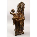 A LARGE 20TH CENTURY GILT BRONZE FIGURE OF A MAN HOLDING A BOY, the figure holding a young child