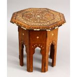 A SMALL 19TH CENTURY INDIAN HARDWOOD OCTAGONAL TRAVELLING OCCASIONAL TABLE, the table inlaid with