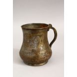 A GOOD PERSIAN ISLAMIC TINNED COPPER TANKARD, with engraved decoration