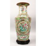 A FINE 19TH CENTURY CHINESE CANTON FAMILLE ROSE PORCELAIN VASE, the body of the vase with panel