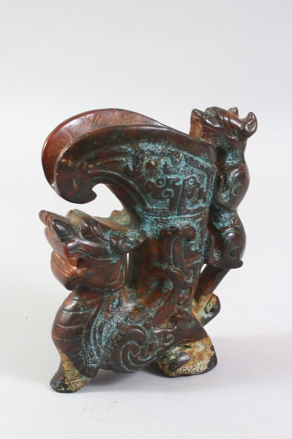 A 20TH CENTURY CHINESE ARCHAIC STYLE CARVED HARDSTONE EWER, the body carved as a dragon, the - Image 2 of 6