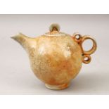 A GOOD CHINESE SONG / YUAN STYLE PORCELAIN WINE POT, with a graduating beige to peach coloured glaze