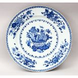 AN 18TH CENTURY CHINESE BLUE & WHOTE PORCELAIN DISH, decorated with scenes of native floral
