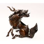 A GOOD 18TH / 19TH CENTURY CHINESE BRONZE CENSER / MODEL OF KIRIN , in a seated position with its