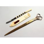 THREE TURKISH OTTOMAN CALLIGRAPHY TOOLS, consisting of a large pair of gold inlaid scissors, 27cm