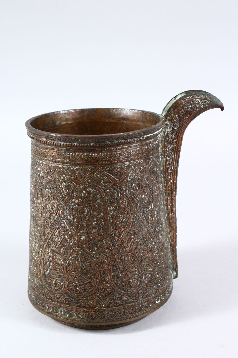 A 19TH CENTURY OR EARLIER INDO PERSIAN COPPERED BRASS SPOUTED JUG, with chased floral motiv - Image 3 of 5
