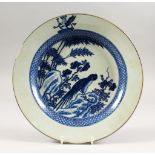 A GOOD 19TH CENTURY CHINESE BLUE & WHITE PORCELAIN PLATE, decorated with landscape and bird